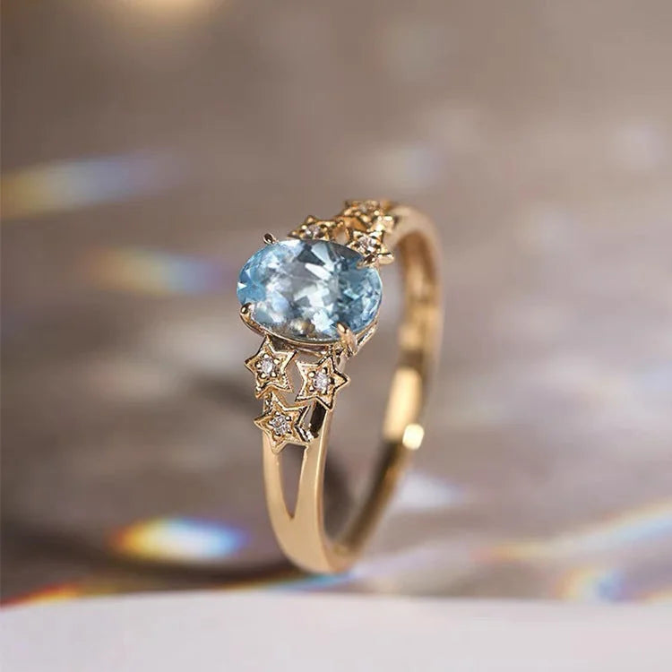 Exclusive Gold Ring with Blue Crystal