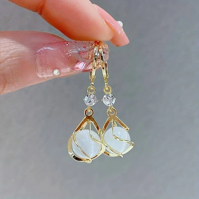 Gold Drop Earrings with White Opal